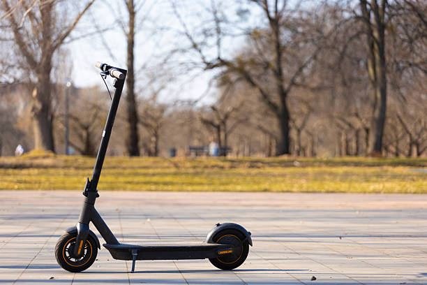 istock Exploring the Future of Urban Mobility with an Electric Scooter: A Stylish and Efficient Ride for Eco-Friendly Commuting in City Parks and Urban Areas 2204608202