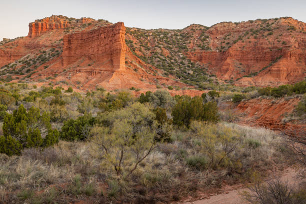 istock Desert cliffs, buttes, and canyons near sunset. 2204611763