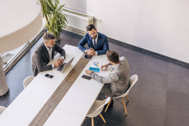 istock Businessmen having a meeting in the office 2204616002