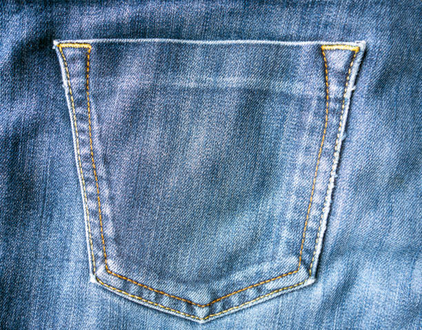 istock Pocket on the back of jeans, close-up. 2204622238