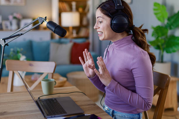 istock Woman working remotely in home office, at workplace with computer as freelancer 2204622277