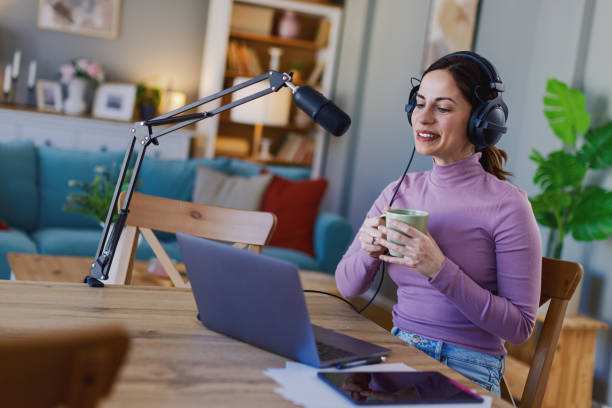 istock Woman working remotely in home office, at workplace with computer as freelancer 2204622393