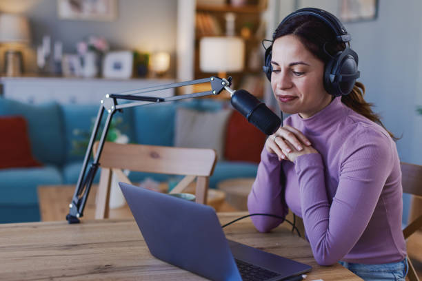 istock Woman working remotely in home office, at workplace with computer as freelancer 2204622499