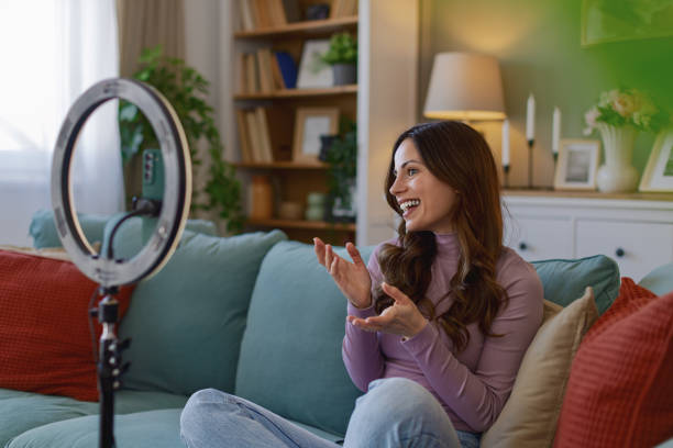 istock Woman working remotely in home office, at workplace with computer as freelancer 2204623145