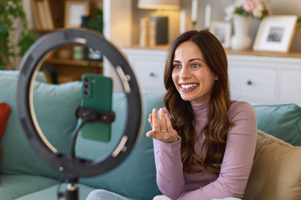istock Woman working remotely in home office, at workplace with computer as freelancer 2204623283