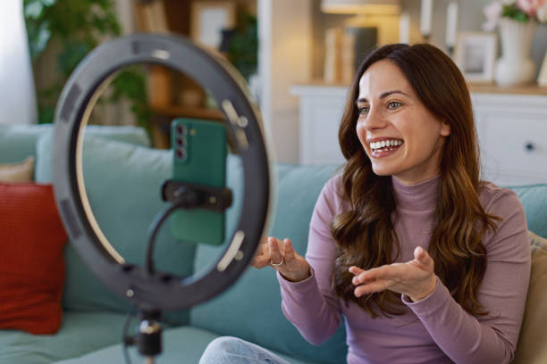istock Woman working remotely in home office, at workplace with computer as freelancer 2204623284