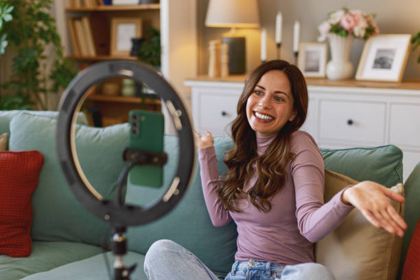istock Woman working remotely in home office, at workplace with computer as freelancer 2204623308