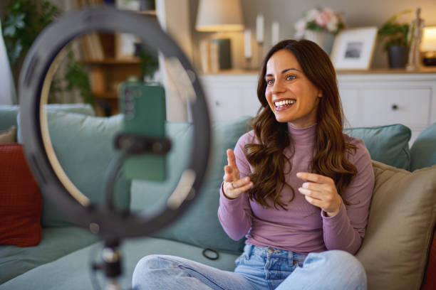 istock Woman working remotely in home office, at workplace with computer as freelancer 2204623955