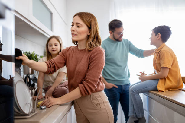 istock Busy family kitchen,mother does dishwashing 2204635078