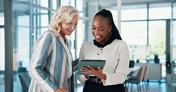 istock Tablet, cooperation and business people in office, conversation and email with positive feedback. Happy employees, partner and consultants with tech, teamwork and digital app for profit increase 2204636124