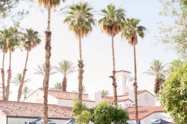 istock Serene desert retreat with classic Spanish architecture and palms 2204642154