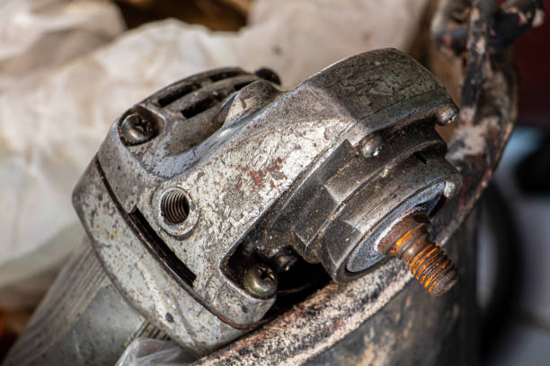 istock An old angle grinder in bucket. A damaged electrical hand tool ready for repair. 2204646227