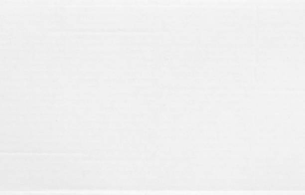 istock White cardboard sheet texture background, detail of recycle paper box pattern. 2204649652