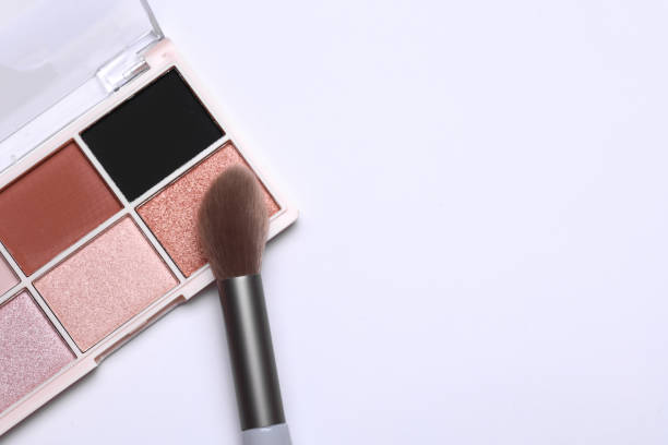 istock Makeup eyeshadow palette and brush on white background 2204650536