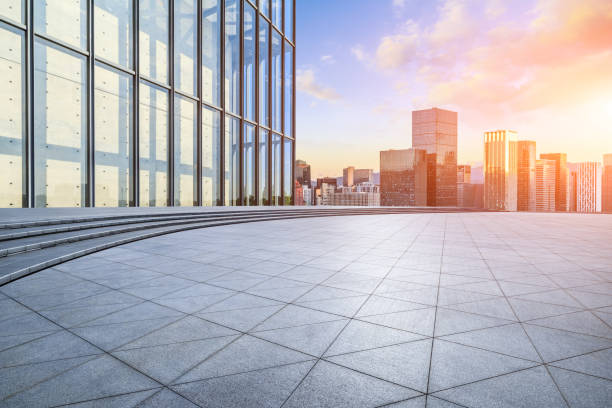 istock Empty square floor and modern city buildings scenery at sunset 2204653531