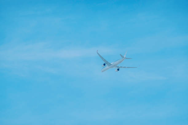 A photo of an airplane with some empty space.