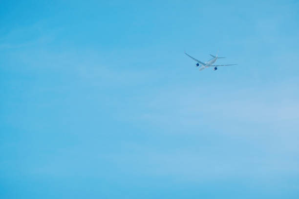 A photo of an airplane with some empty space.