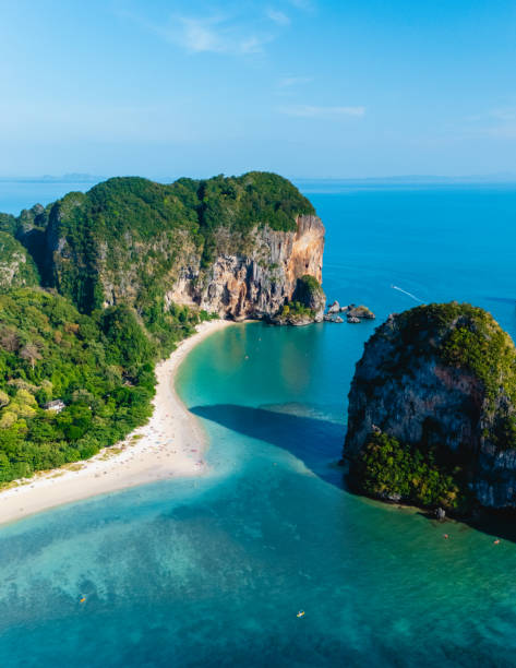 istock Serene turquoise waters and lush cliffs invite tranquility at Railay Beach in Krabi Thailand 2204654368