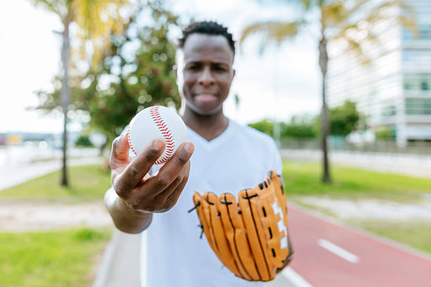 a boy throwing a ball 