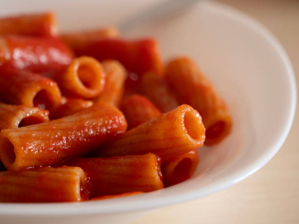 istock rigatoni pasta with tomato sauce 2204659808