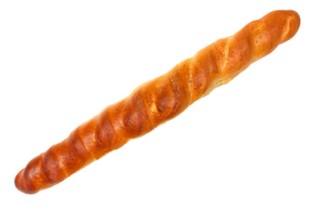 Studio shot of sausage roll cut out against a white background