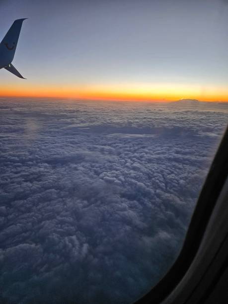 istock Cloudy Evening at 35000 feet 2204662656