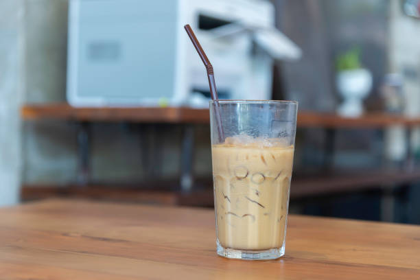 Iced coffee on wooden counter bar