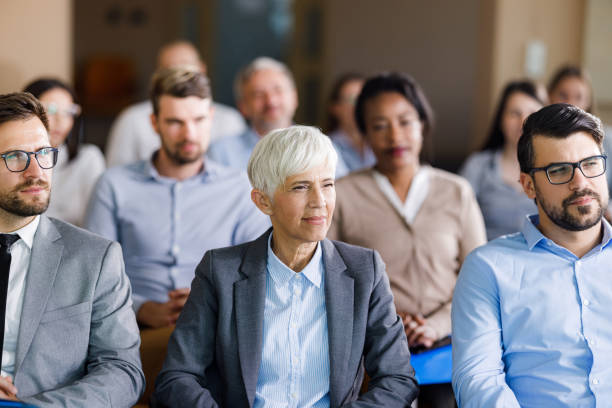istock Entrepreneurs attending a business seminar in board room. 2204664377