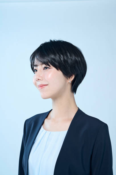 istock Female office worker with short hair 2204666012