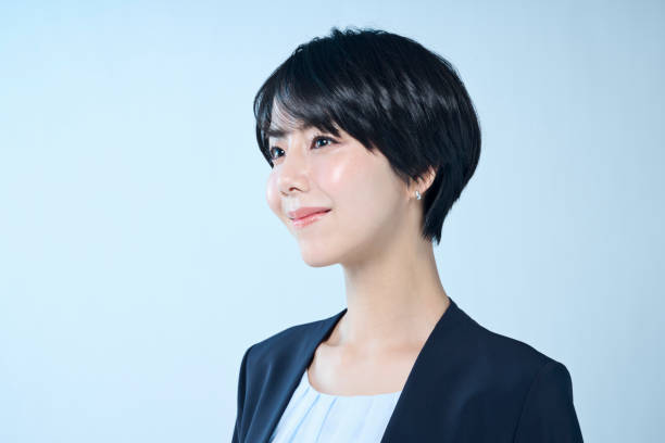 istock Female office worker with short hair 2204666194