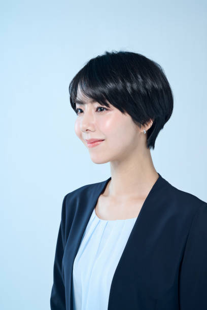 istock Female office worker with short hair 2204666305
