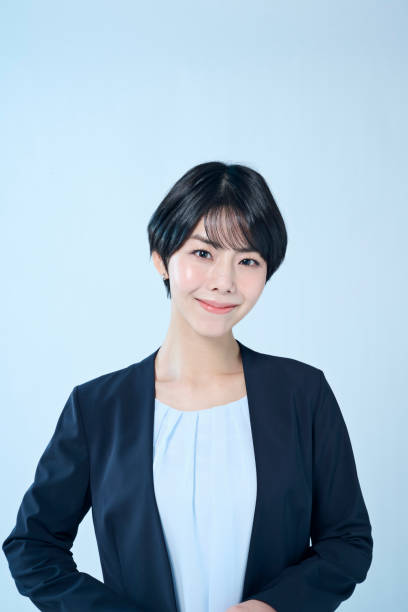 istock Female office worker with short hair 2204666345
