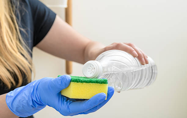 istock House cleaning with dangerous chemicals protective gloves 2204667831