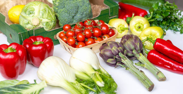 istock Fresh and healthy organic vegetables on the white table. 2204668185