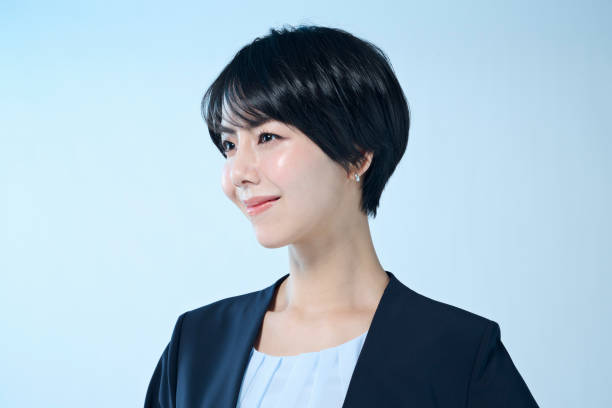 istock Female office worker with short hair 2204670054