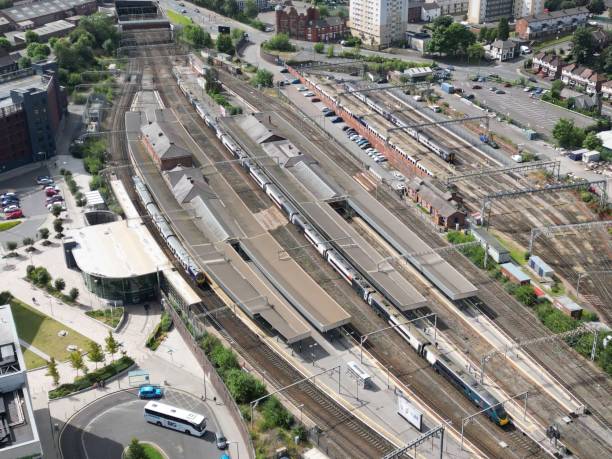 istock Aerial view of a bustling train station with multiple platforms. 2204671693