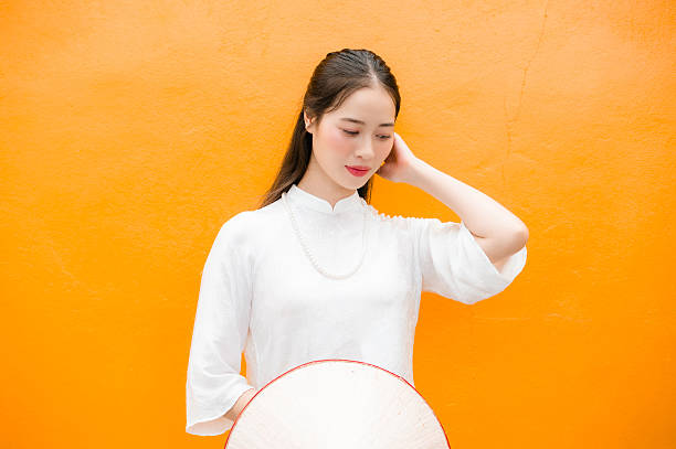 istock Vietnamese woman and landmark 2204674826