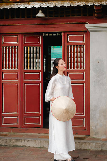 istock Vietnamese woman and landmark 2204674954