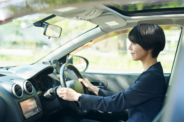 istock Female office worker in her 30s who drives a car 2204677424