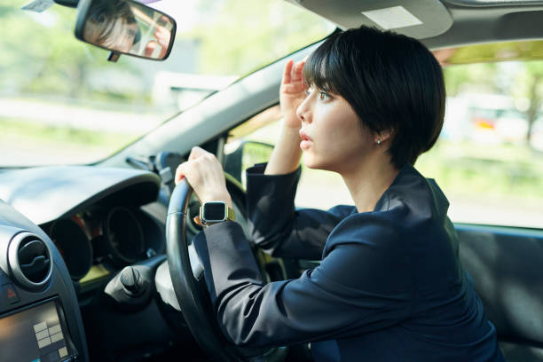 istock Female office worker in her 30s who drives a car 2204677558
