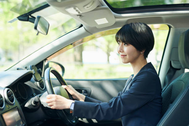 istock Female office worker in her 30s who drives a car 2204680503