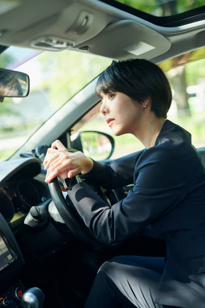 istock Female office worker in her 30s who drives a car 2204680866