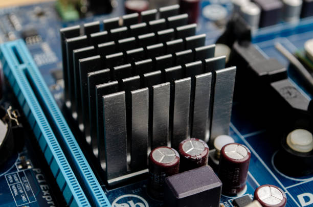 Electronic printed circuit board with SMD components, with chips, and cooling radiators