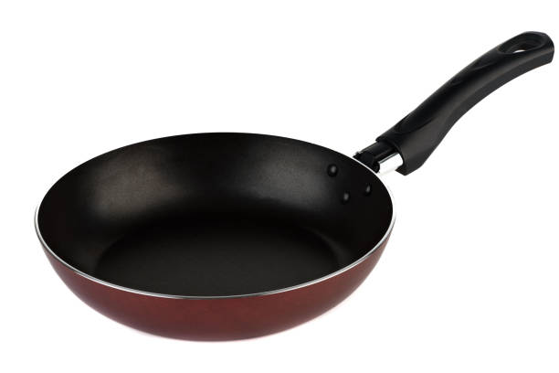 istock New frying pan with non-stick coating and durable black handle. 2204688628