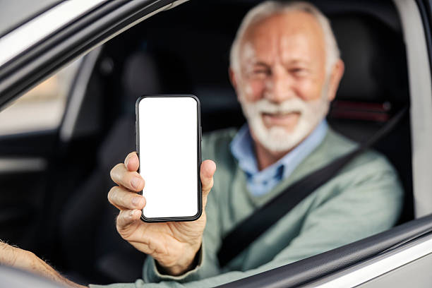 istock Selective focus on senior man's hands holding cellphone and showing it at the camera. 2204689741