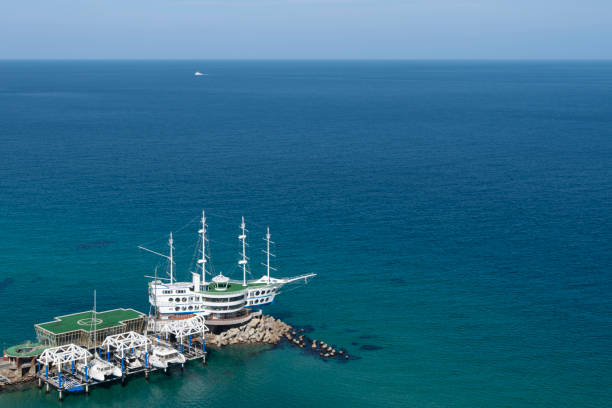 restaurant building in the shape of ship, idyllic seascape