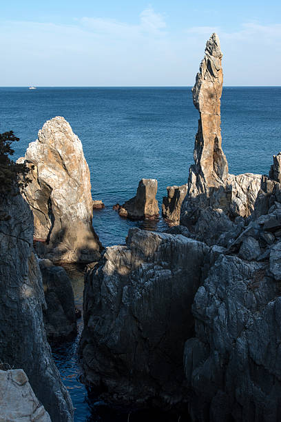 istock High-angle view of the rocks and cliff on the sea 2204690621