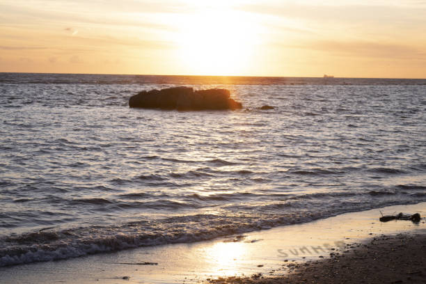 istock sunset on the Ostia lido beach 2204698551