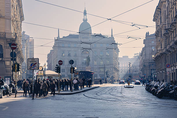 Milan, Italy. February 05, 2025. Dante Street (Via Dante) on a foggy winter day. Codursio Square