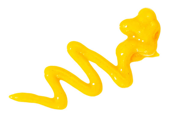 istock Yellow mustard sauce isolated on white. Fresh honey Mustard spread zigzag  stain Top view. Flat lay. Package design element 2204704320